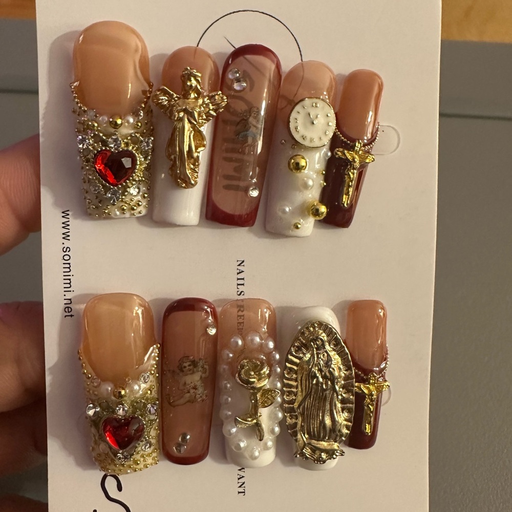 Elegant Nail Art Set with Gold and Red Accents